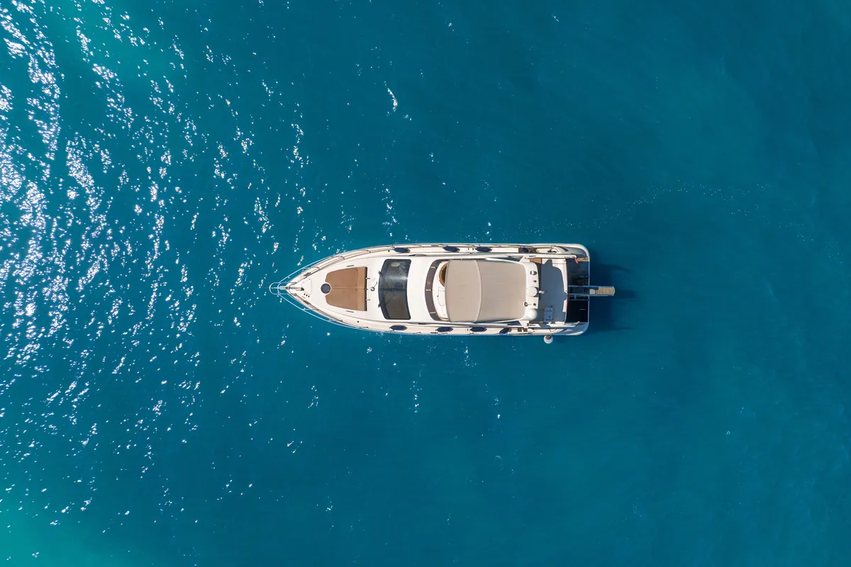 Exterior view of Lena, a Azimut 50 Flybridge motor yacht at Lignano Sabbiadoro / Lignan, Italy
