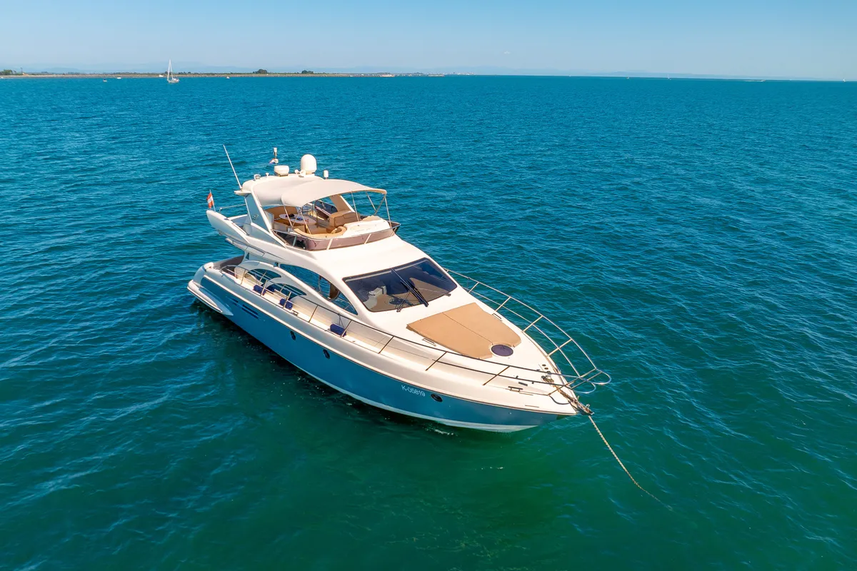 Exterior view of Lena, a Azimut 50 Flybridge motor yacht at Lignano Sabbiadoro / Lignan, Italy