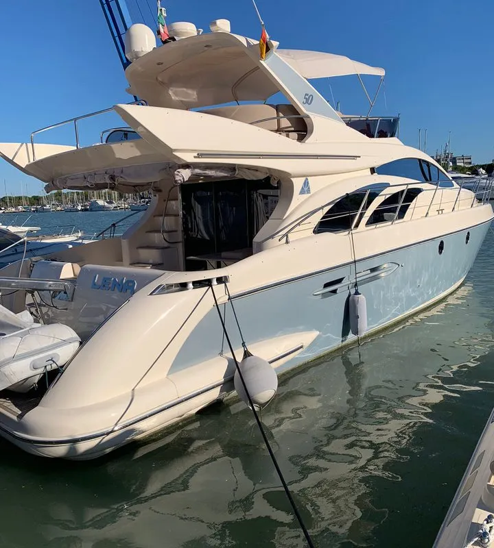 Exterior view of Lena, a Azimut 50 Flybridge motor yacht at Lignano Sabbiadoro / Lignan, Italy