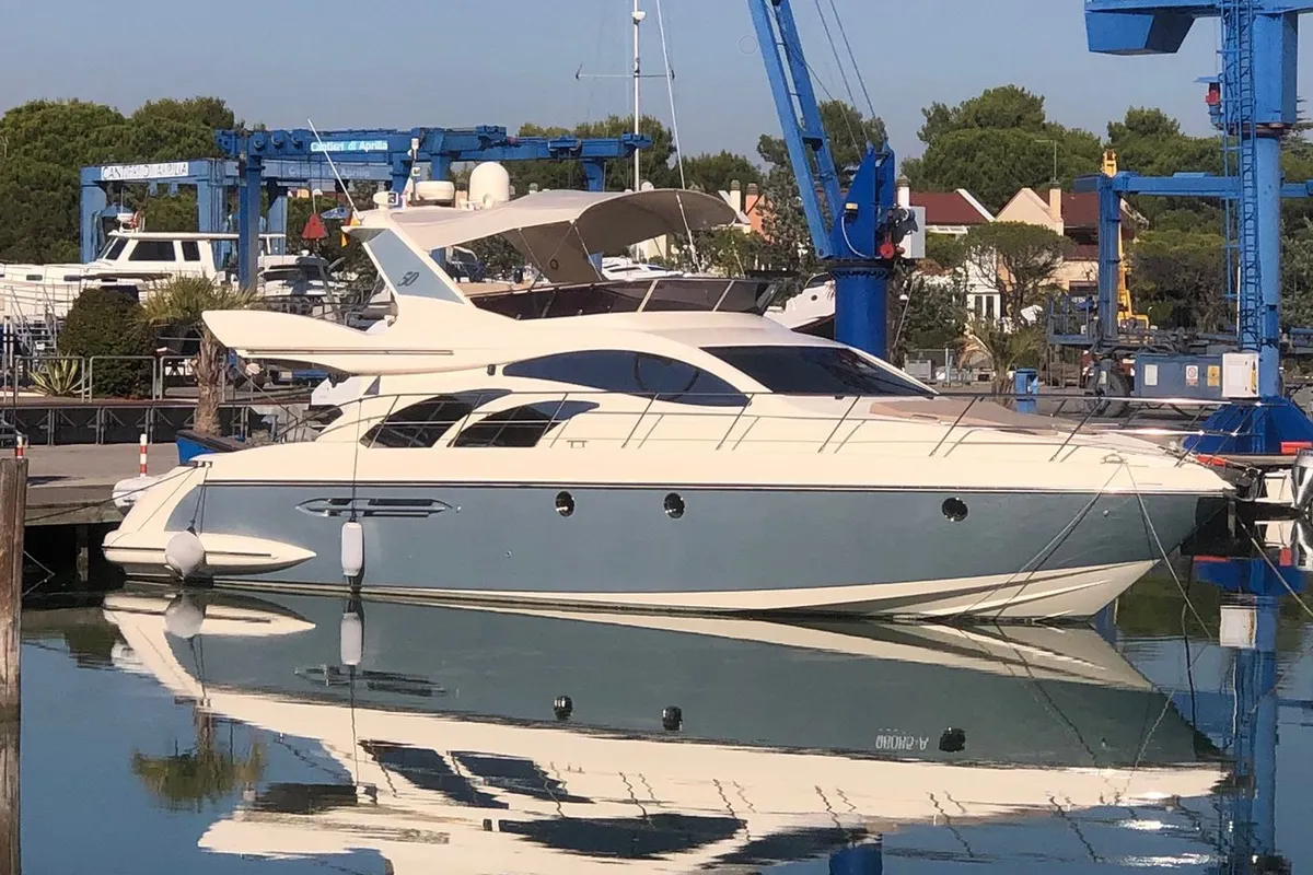 Exterior view of Lena, a Azimut 50 Flybridge motor yacht at Lignano Sabbiadoro / Lignan, Italy