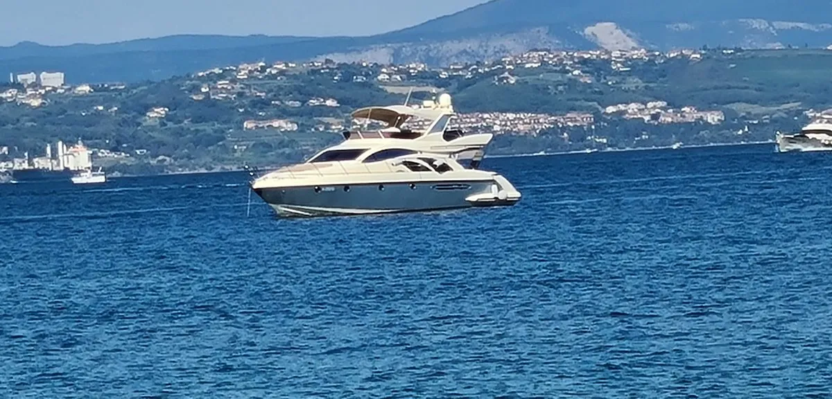 Exterior view of Lena, a Azimut 50 Flybridge motor yacht at Lignano Sabbiadoro / Lignan, Italy