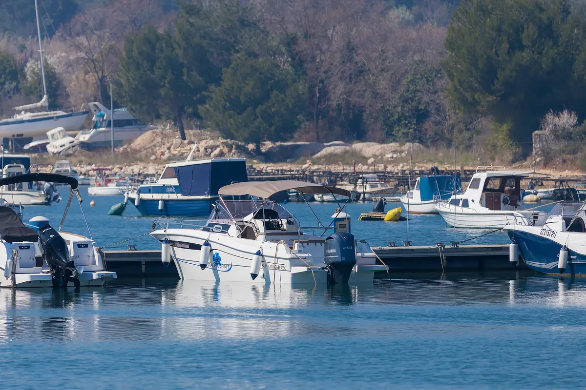 No Name, a Pacific Craft 750 Sun Cruiser motorboat at Grad Pula, Croatia