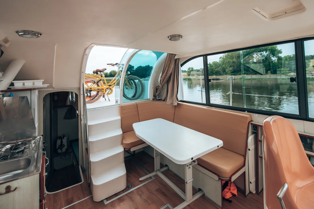 Salon of Allegro 1, a Nicols Confort 900 DP motorboat at Sablé-sur-Sarthe, France