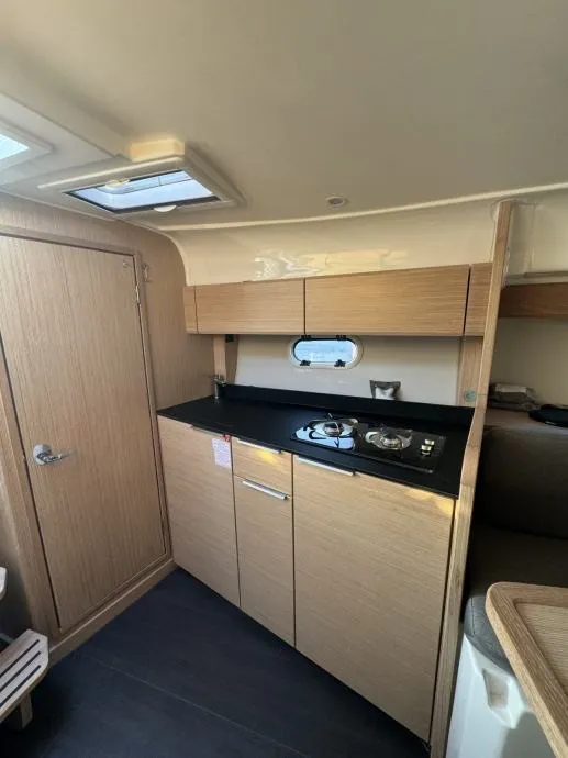 Galley of Lui, a Bavaria S30 motorboat at Grad Pula, Croatia