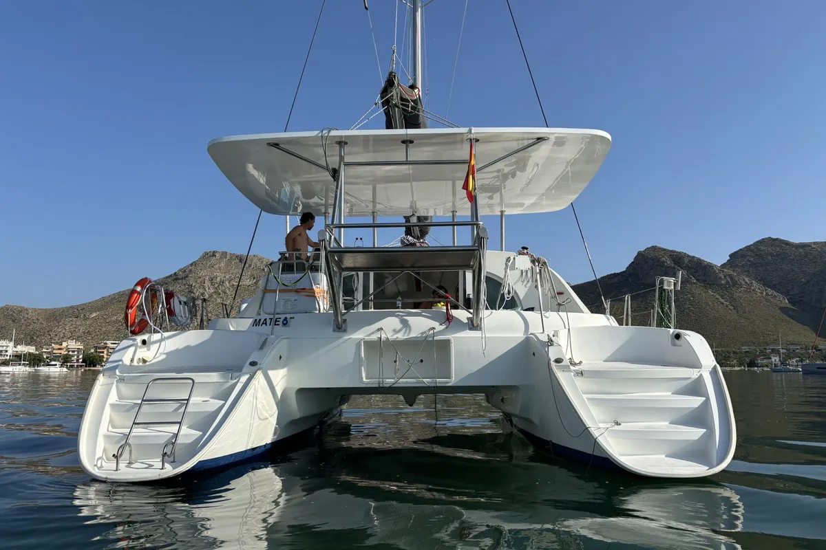 Exterior view of Mate, a Lagoon 380 S2 catamaran at Ibiza, Spain