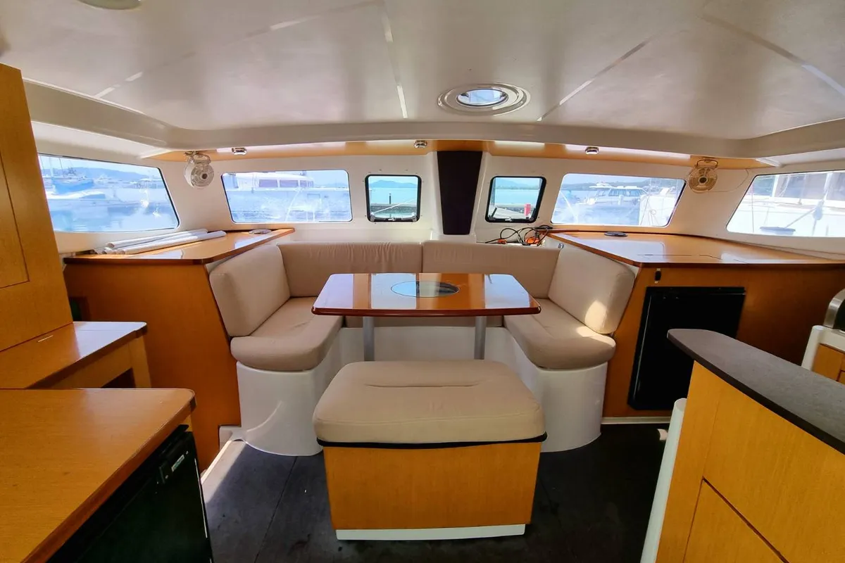 Salon of Happy Eva, a Fountaine Pajot Mahe 36 catamaran at Mai Khao, Thailand