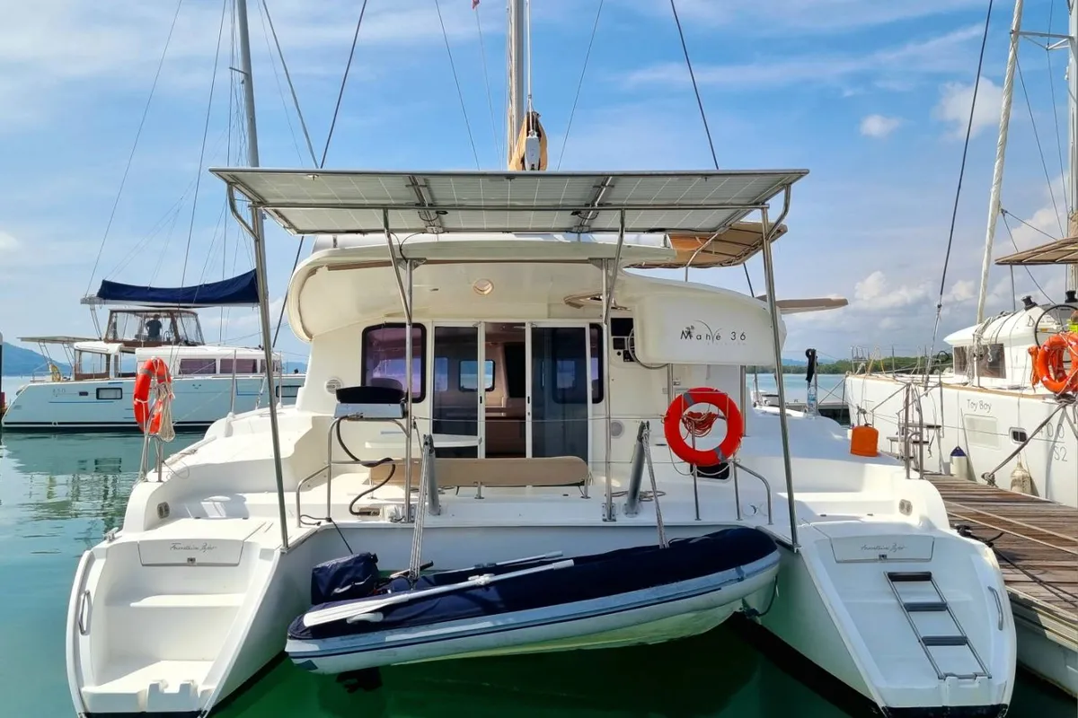 Exterior view of Happy Eva, a Fountaine Pajot Mahe 36 catamaran at Mai Khao, Thailand