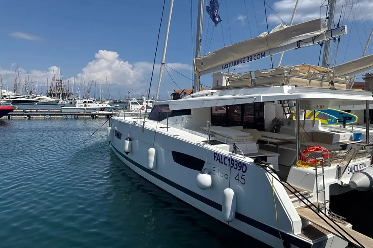 Exterior view of Santuzza, a Fountaine Pajot Elba 45 catamaran at Cagliari, Italy