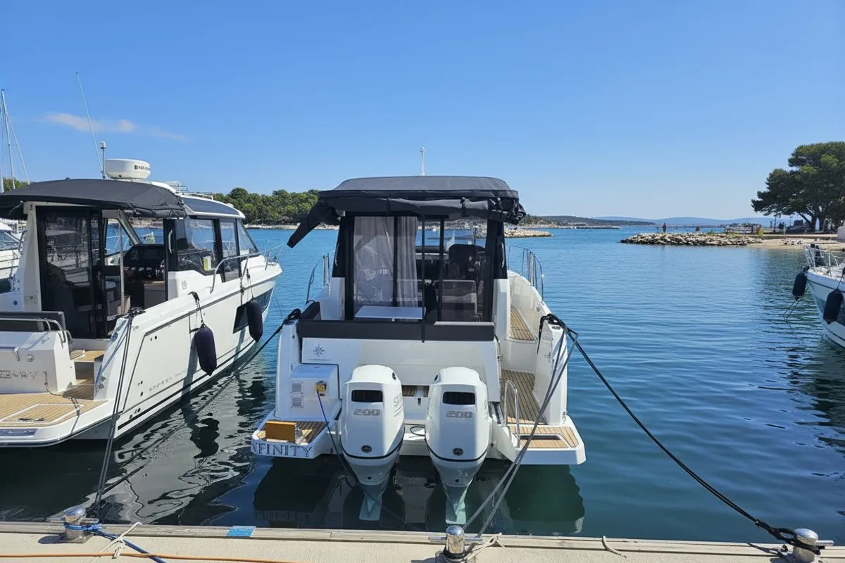 Exterior view of Infinity, a Jeanneau Merry Fisher 895 motorboat at Grad Biograd na Moru, Croatia