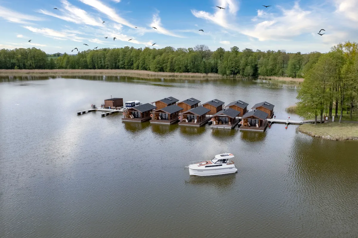 Exterior view of Holland, a Northman Nexus Revo 870 Prestige motorboat at Sztynort, Poland
