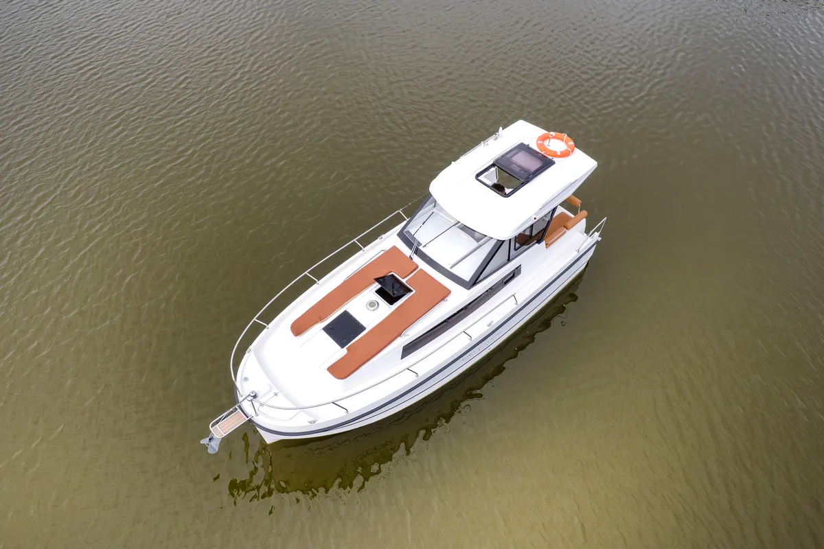 Exterior view of Holland, a Northman Nexus Revo 870 Prestige motorboat at Sztynort, Poland