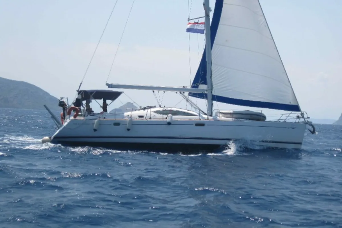Exterior view of Idrea, a Jeanneau Sun Odyssey 49 DS sailboat at Lavreotiki Municipal Unit, Greece