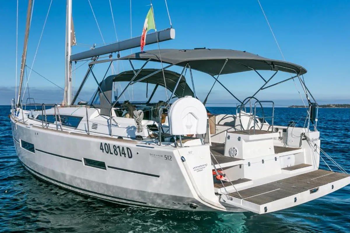 Exterior view of Sofia, a Dufour 512 Grand Large sailboat at Olbia, Italy