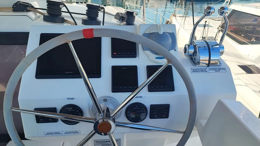 Cockpit of Reina, a Fountaine Pajot Astrea 42 catamaran at Fethiye, Turkey