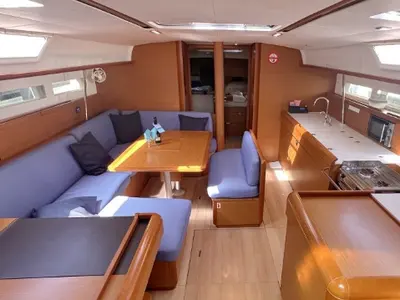 Salon of Alea, a Jeanneau Sun Odyssey 519 sailboat at Orbetello, Italy