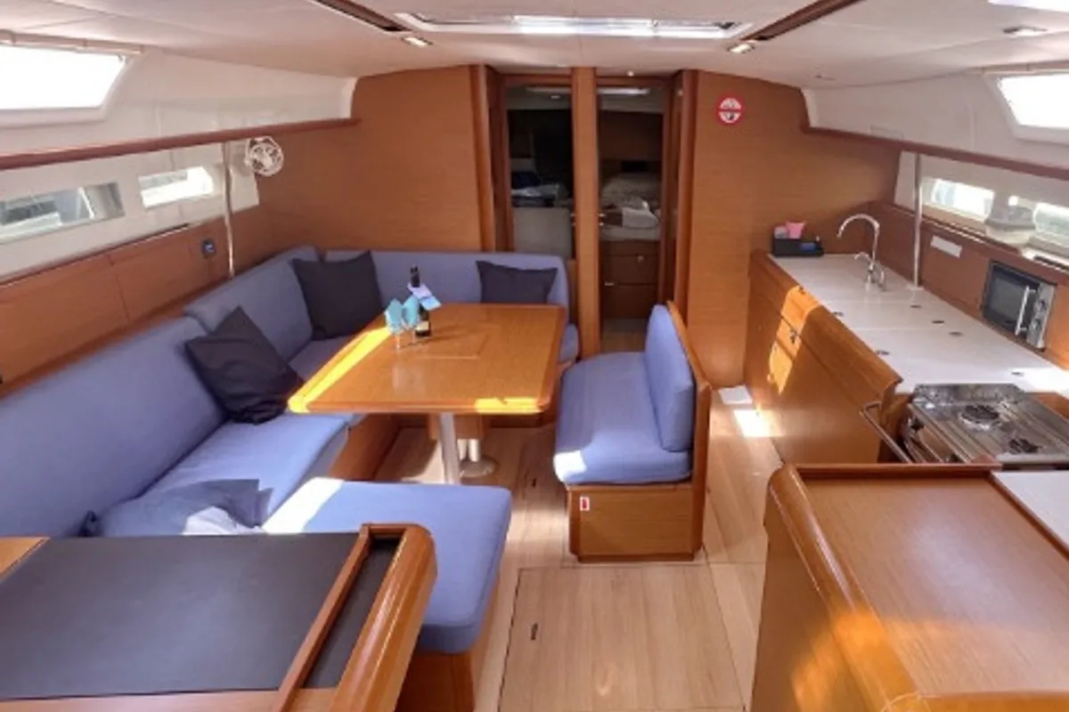 Salon of Alea, a Jeanneau Sun Odyssey 519 sailboat at Orbetello, Italy