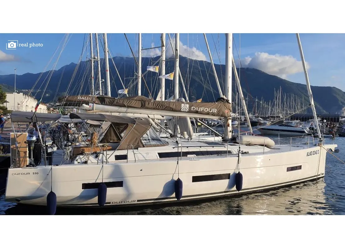 Exterior view of Cassiopea - A/C, Generator, Water maker, Solar Panel, a Dufour 530 sailboat at Olbia, Italy