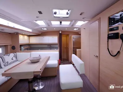 Salon of Cassiopea - A/C, Generator, Water maker, Solar Panel, a Dufour 530 sailboat at Olbia, Italy