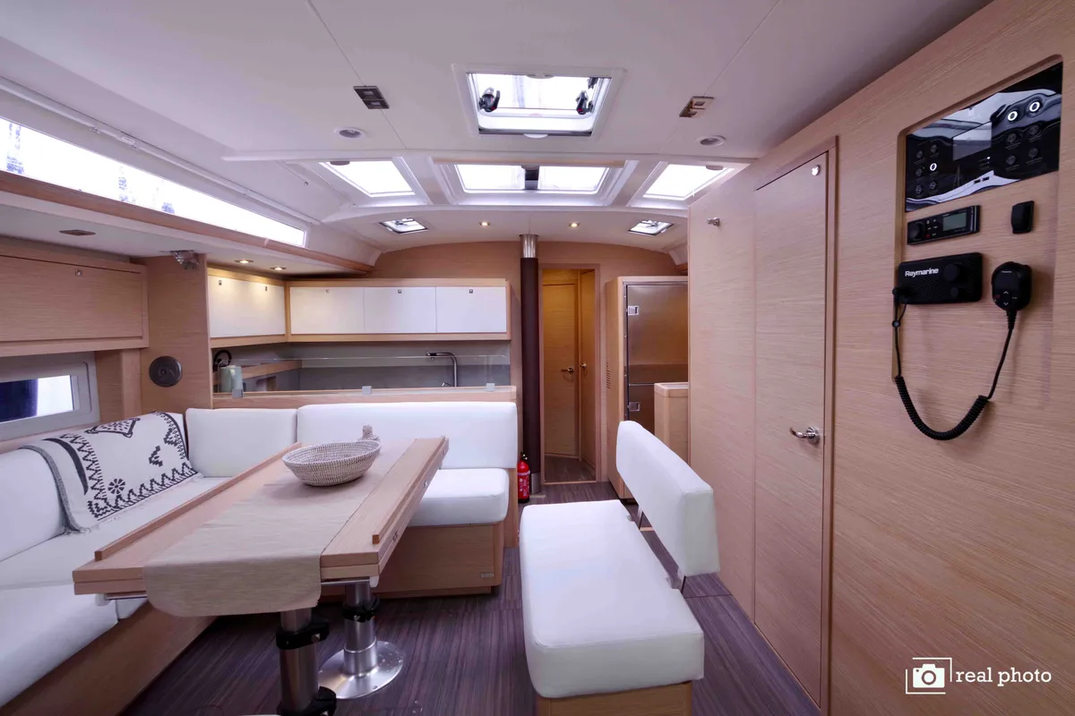 Salon of Cassiopea - A/C, Generator, Water maker, Solar Panel, a Dufour 530 sailboat at Olbia, Italy