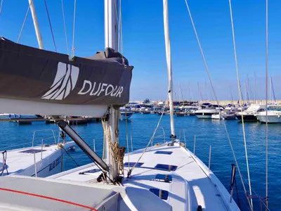 Deck of Cassiopea - A/C, Generator, Water maker, Solar Panel, a Dufour 530 sailboat at Olbia, Italy