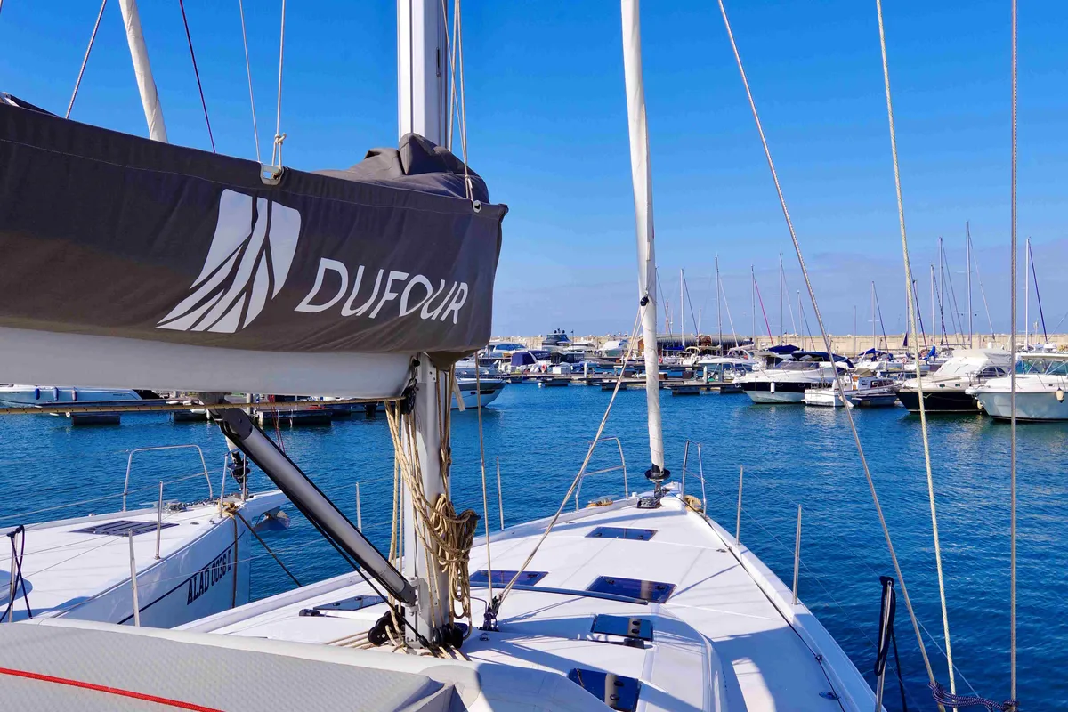 Deck of Cassiopea - A/C, Generator, Water maker, Solar Panel, a Dufour 530 sailboat at Olbia, Italy
