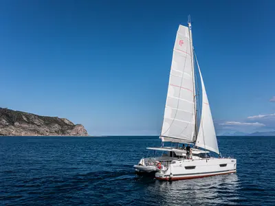 Relax Planet, a Fountaine Pajot Lucia 40 catamaran at Tonnarella, Italy