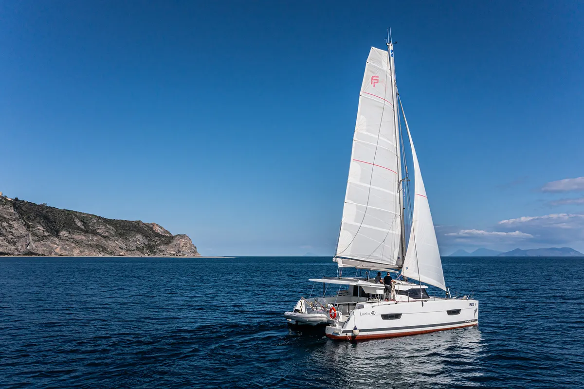 Relax Planet, a Fountaine Pajot Lucia 40 catamaran at Tonnarella, Italy