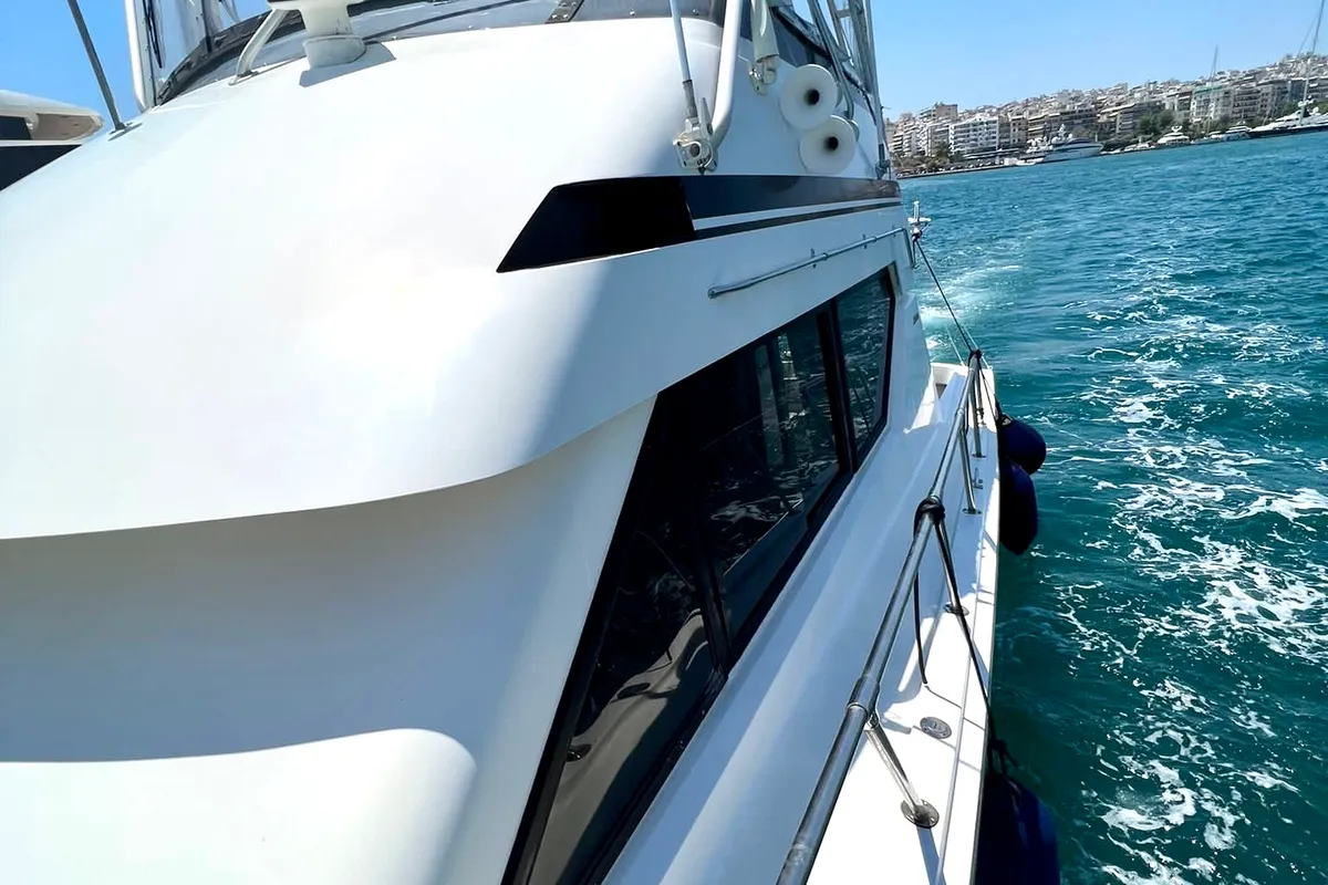Exterior view of Tipejyas, a Gulet Hatteras 50 Convertible motorboat at Athens, Greece