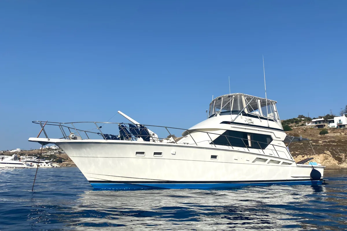 Exterior view of Tipejyas, a Gulet Hatteras 50 Convertible motorboat at Athens, Greece