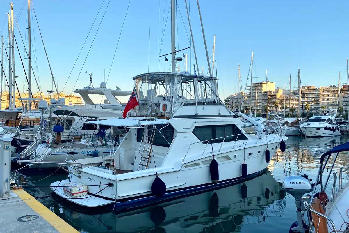 Exterior view of Tipejyas, a Gulet Hatteras 50 Convertible motorboat at Athens, Greece