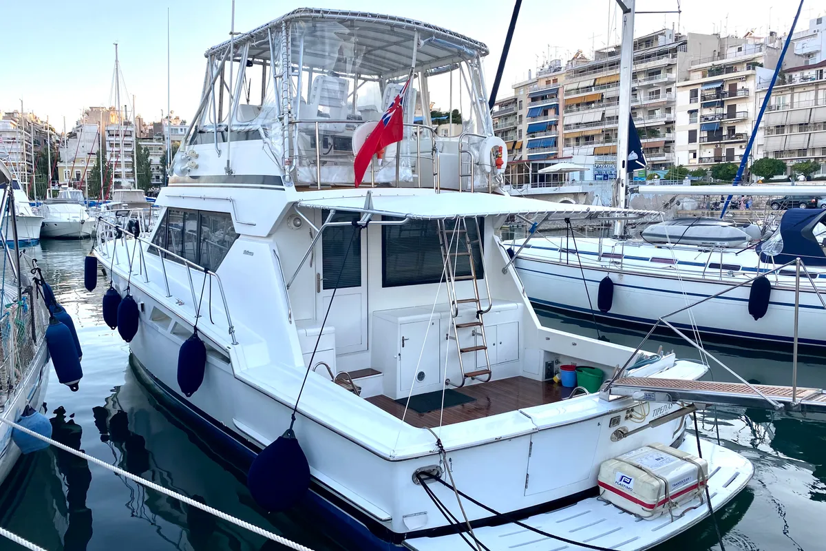 Exterior view of Tipejyas, a Gulet Hatteras 50 Convertible motorboat at Athens, Greece