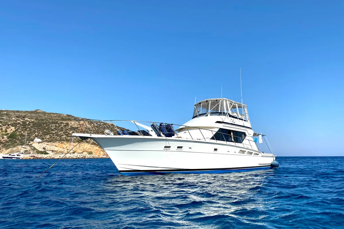 Exterior view of Tipejyas, a Gulet Hatteras 50 Convertible motorboat at Athens, Greece