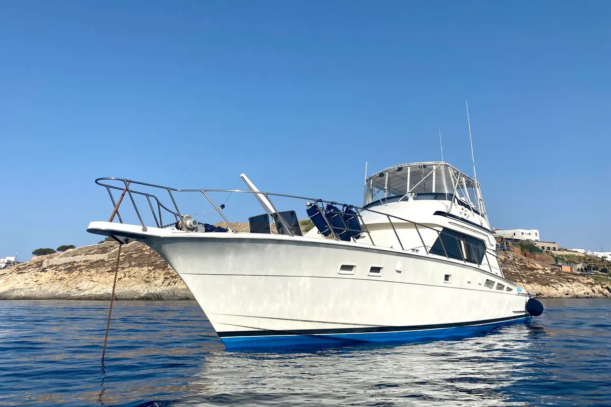 Exterior view of Tipejyas, a Gulet Hatteras 50 Convertible motorboat at Athens, Greece