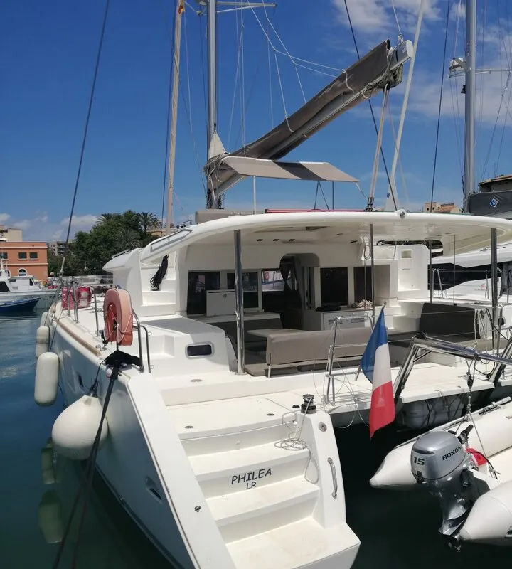 Exterior view of Philea, a Lagoon 450 catamaran at Palma de Mallorca, Spain