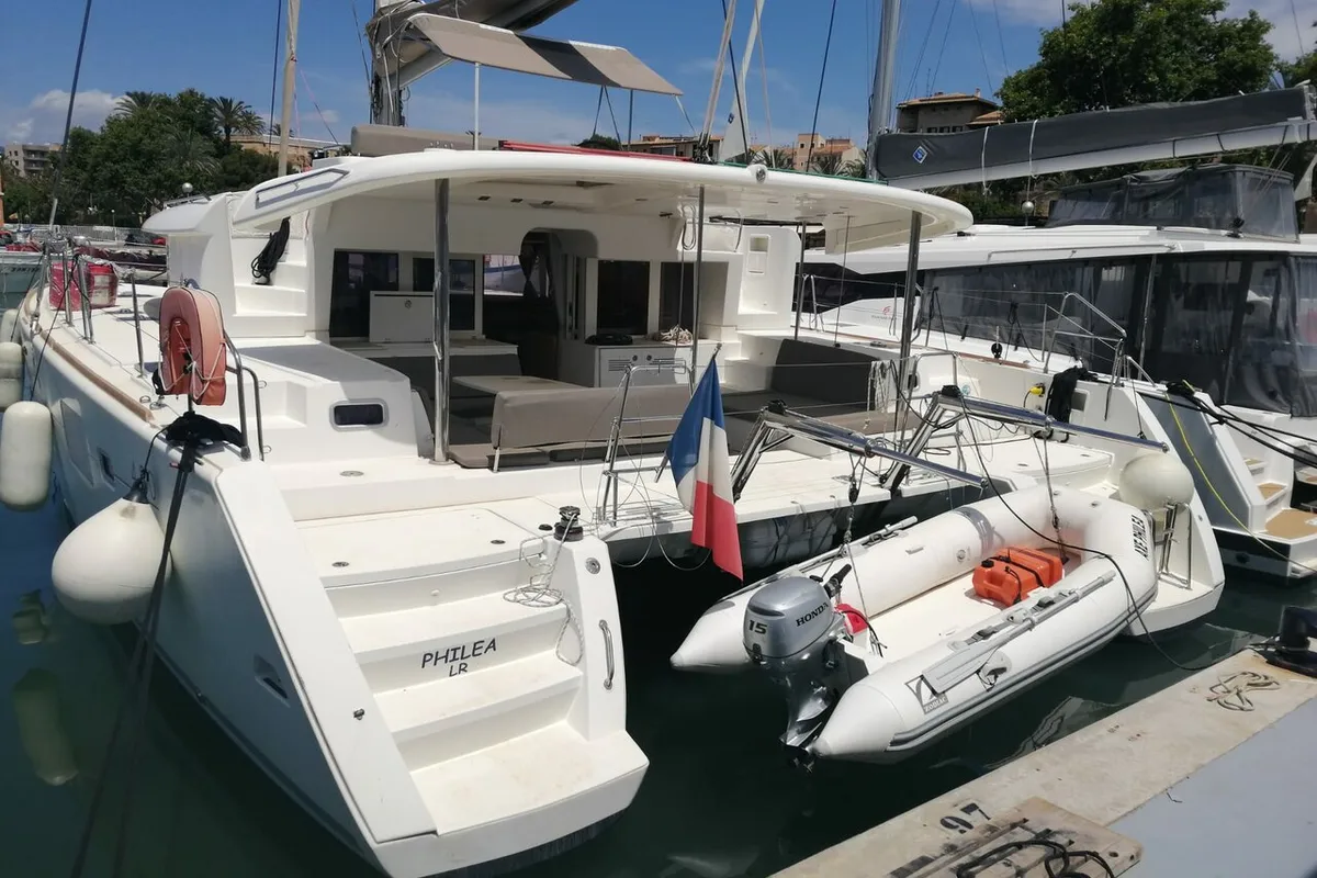 Exterior view of Philea, a Lagoon 450 catamaran at Palma de Mallorca, Spain
