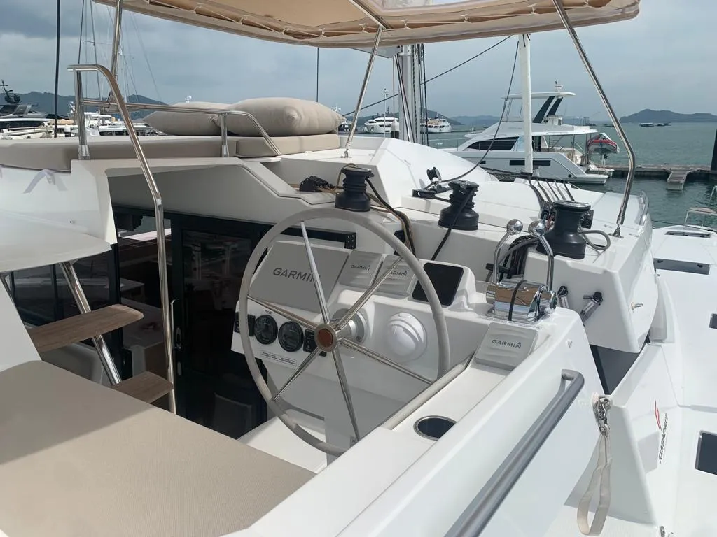Cockpit of Shavasan, a Fountaine Pajot Elba 45 catamaran at Mai Khao, Thailand
