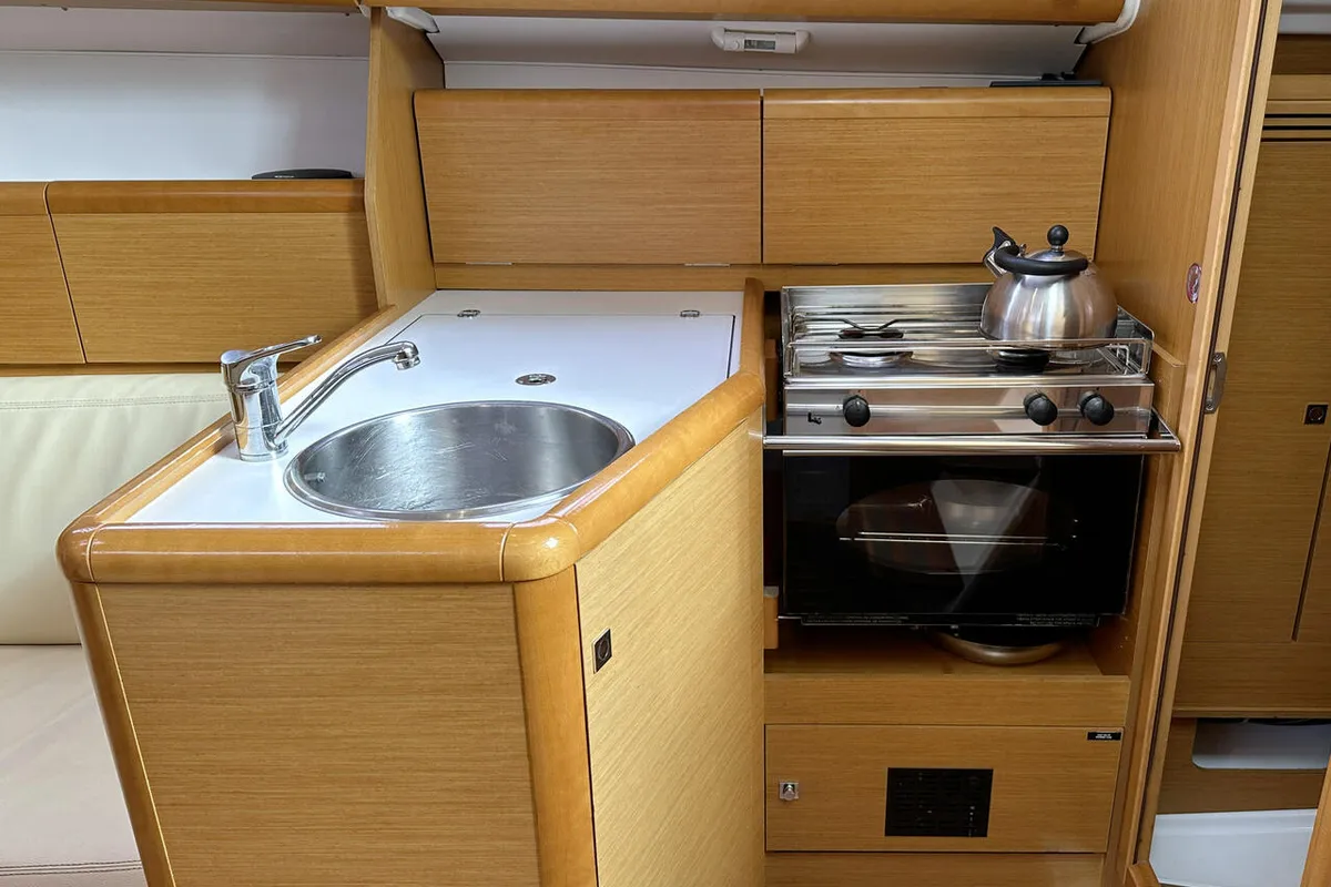 Galley of Storm, a Jeanneau Sun Odyssey 30i sailboat at Heiligenhafen, Germany