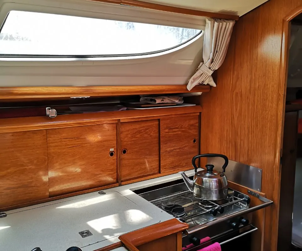Galley of Kama, a Jeanneau Sun Odyssey 35 sailboat at Municipal Unit of Nea Peramos, Greece