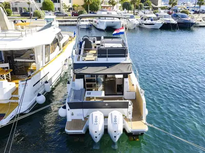 Lino, a Jeanneau Merry Fisher 1095 Fly Serie2 motorboat at Grad Biograd na Moru, Croatia