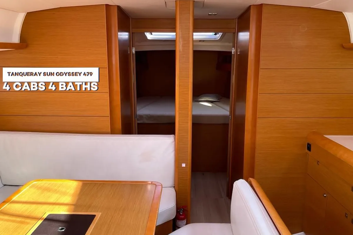Salon of Tanqueray, a Jeanneau Sun Odyssey 479 sailboat at Capo d'Orlando, Italy