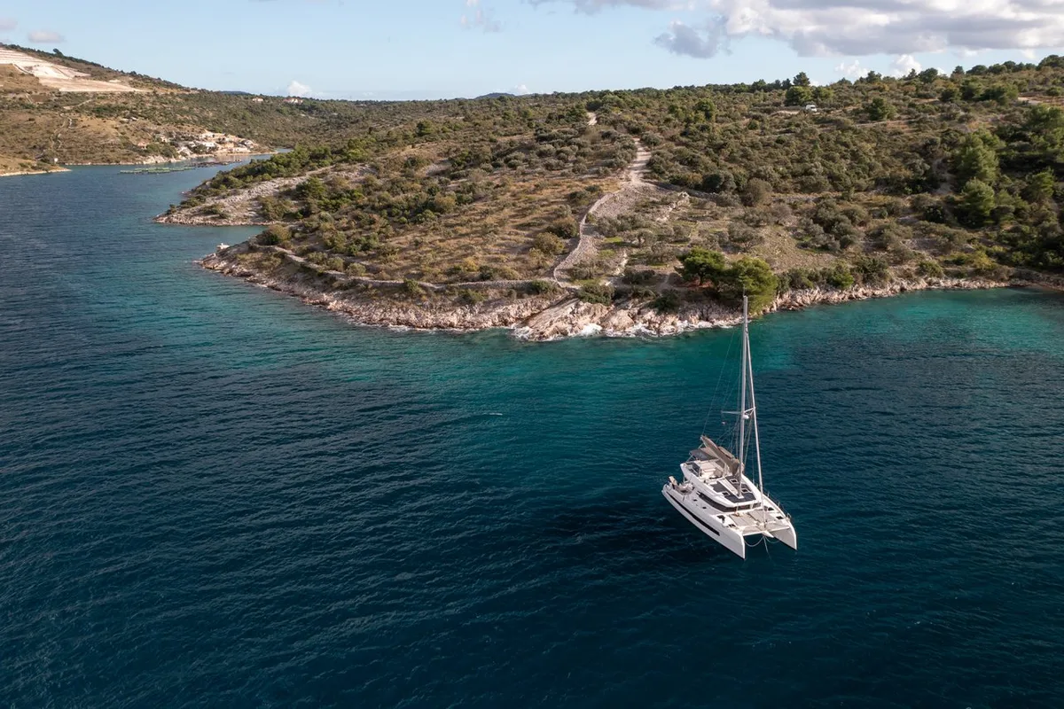 Exterior view of Bela, a Cervetti 44 catamaran at Primošten, Croatia