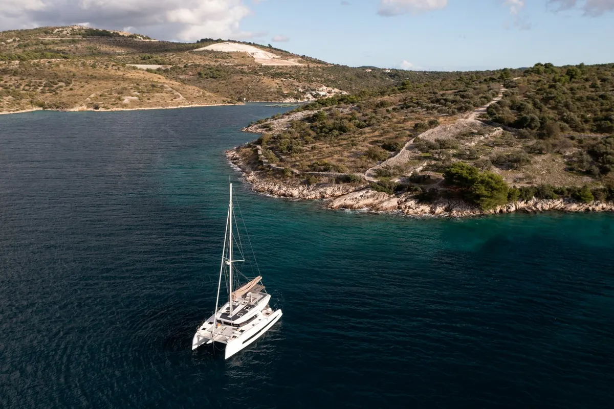 Exterior view of Bela, a Cervetti 44 catamaran at Primošten, Croatia