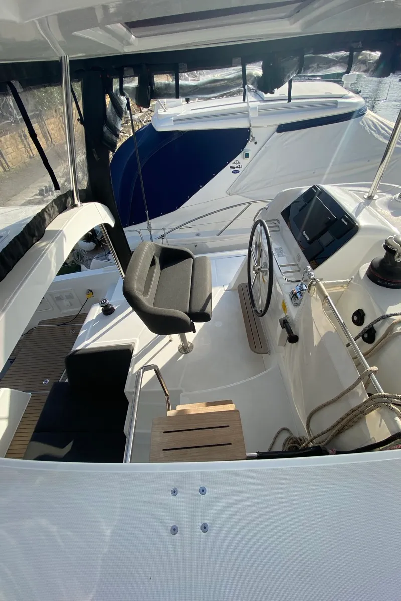 Cockpit of Delta Aquarii, a Lagoon 42 catamaran at Tonnarella, Italy