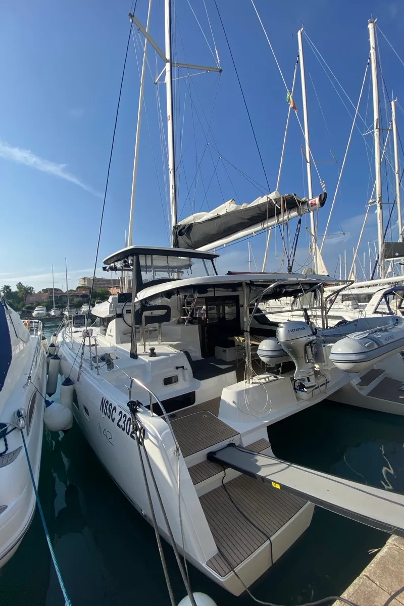 Exterior view of Delta Aquarii, a Lagoon 42 catamaran at Tonnarella, Italy