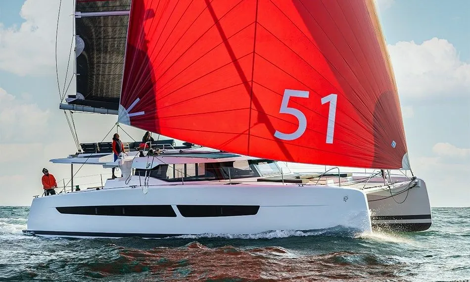 Aerial, a Fountaine Pajot Aura 51 catamaran at Platys Gialos, Greece