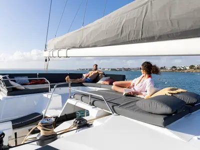 Aerial, a Fountaine Pajot Aura 51 catamaran at Platys Gialos, Greece