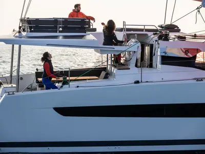 Aerial, a Fountaine Pajot Aura 51 catamaran at Platys Gialos, Greece