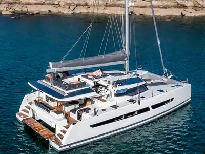 Aerial, a Fountaine Pajot Aura 51 catamaran at Platys Gialos, Greece
