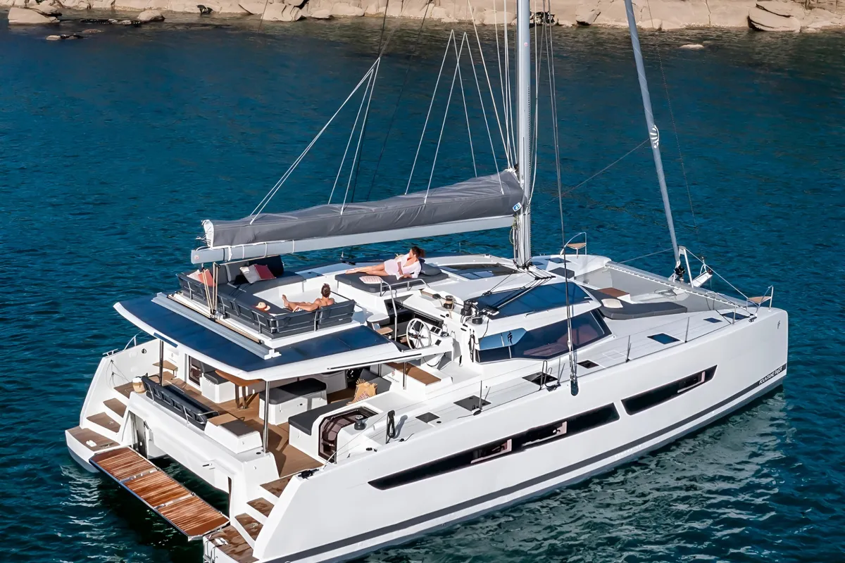 Aerial, a Fountaine Pajot Aura 51 catamaran at Platys Gialos, Greece