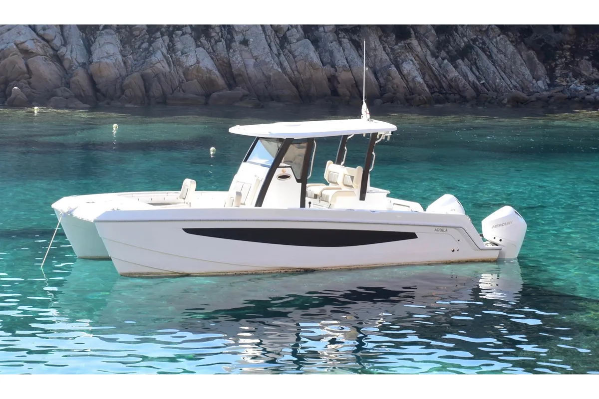 Exterior view of Eagle I, a Aquila 28 motorboat at Cannigione, Italy